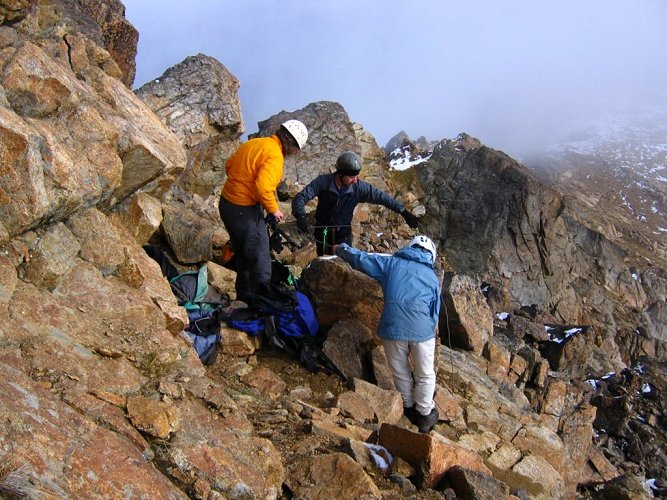 We needed to make one steep step down a gully that was slippery from runoff.
I scrambled down it, but the group decided it would be a good opportunity to practice belaying.